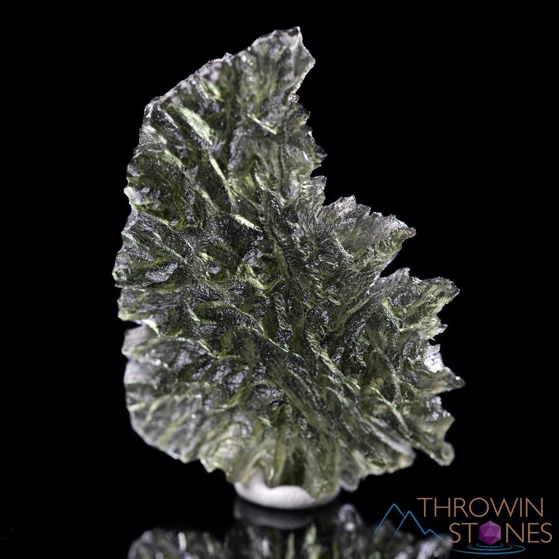 Unlock the Mystical Powers of Moldavite: The Stone of Transformation